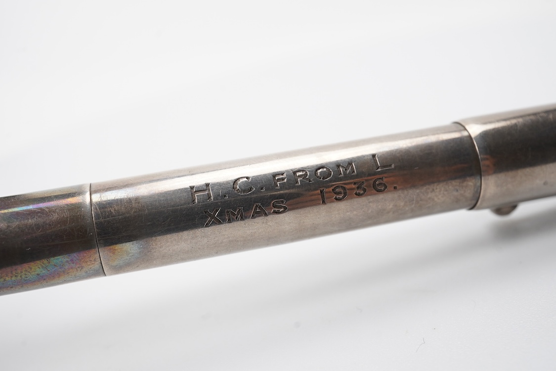 A rare A De la Rue Onoto Sterling silver combination fountain pen and pencil, lever filler and propelling pencil